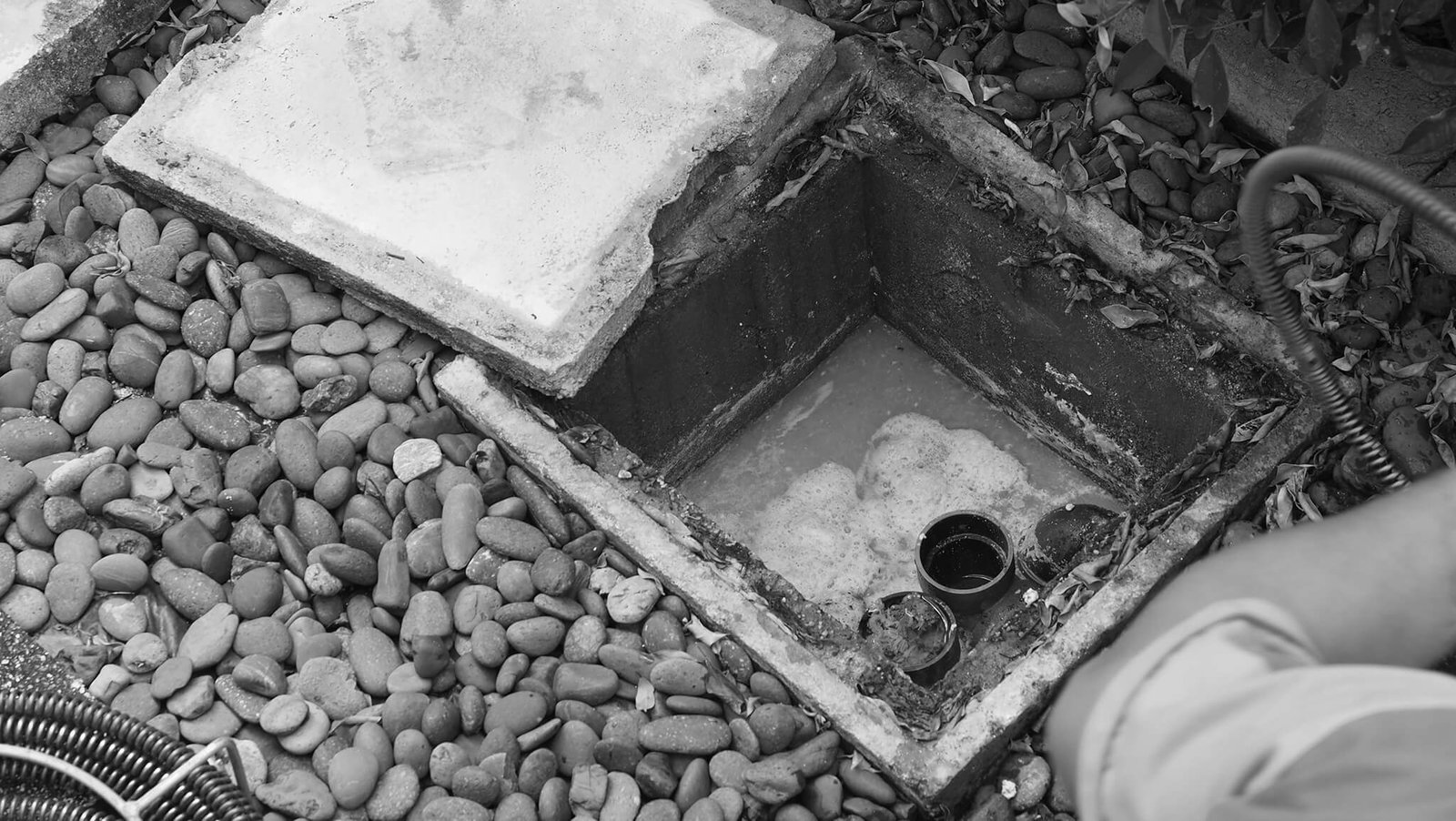 A blocked drain in a customers garden