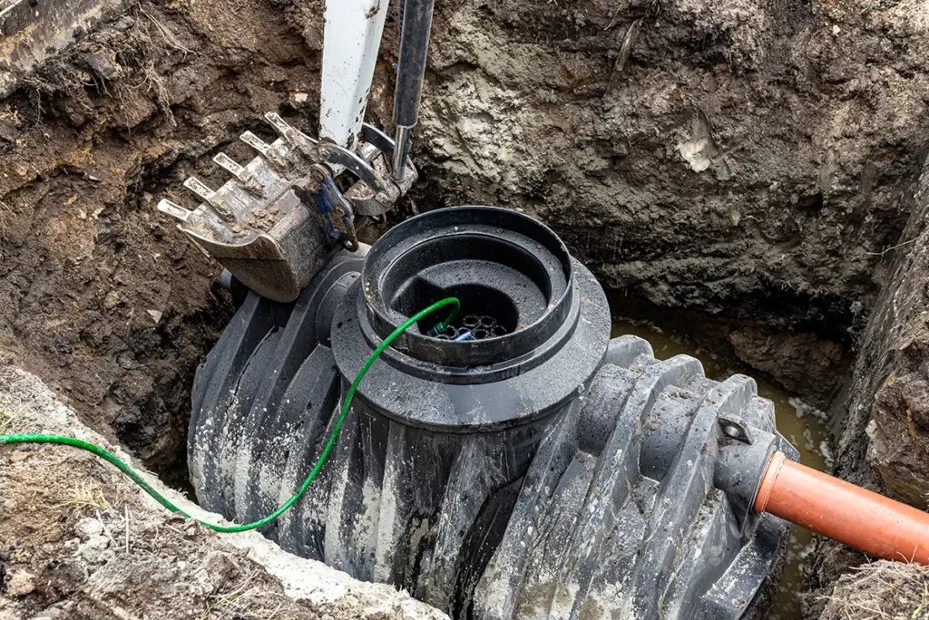 Drain Pro North West installing a new septic tank in a property
