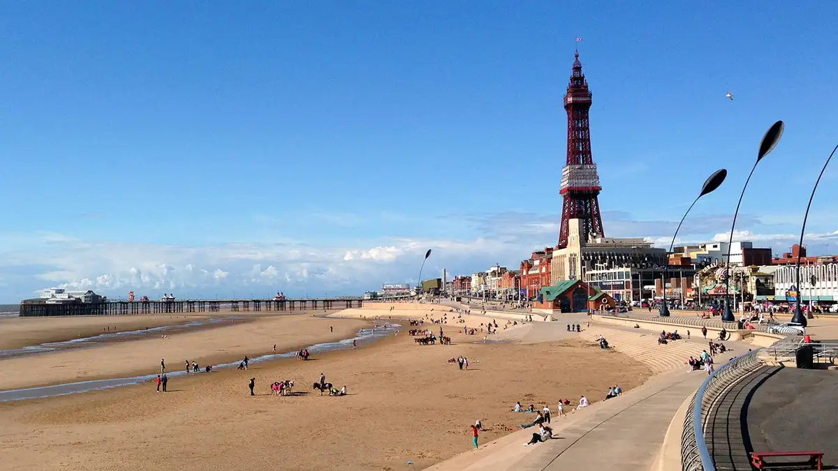 A shot of Blackpool showing the beach and Blackpool Tower on a sunny day